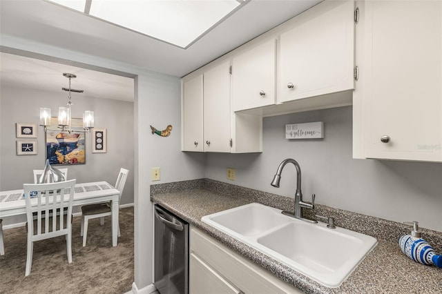 kitchen with hanging light fixtures, a sink, a notable chandelier, white cabinetry, and stainless steel dishwasher