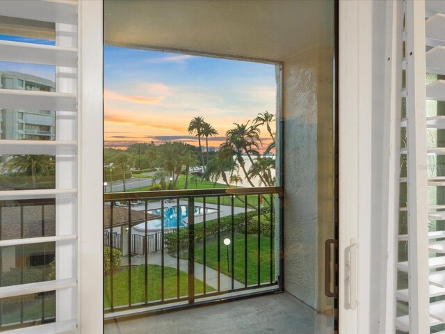 view of balcony at dusk