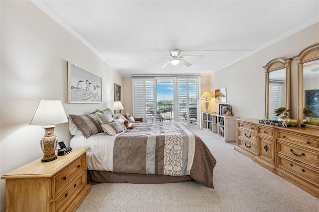 carpeted bedroom with crown molding, access to outside, and ceiling fan