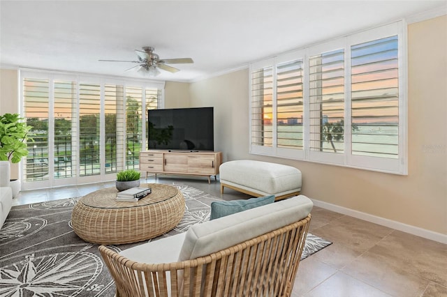 100 Oakmont Ln Unit 301, Belleair, FL 33756 - tiled living room with ceiling fan, crown molding, and baseboards
