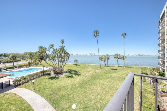 100 Oakmont Ln Unit 301, Belleair, FL 33756 - view of green lawn with a water view and a community pool
