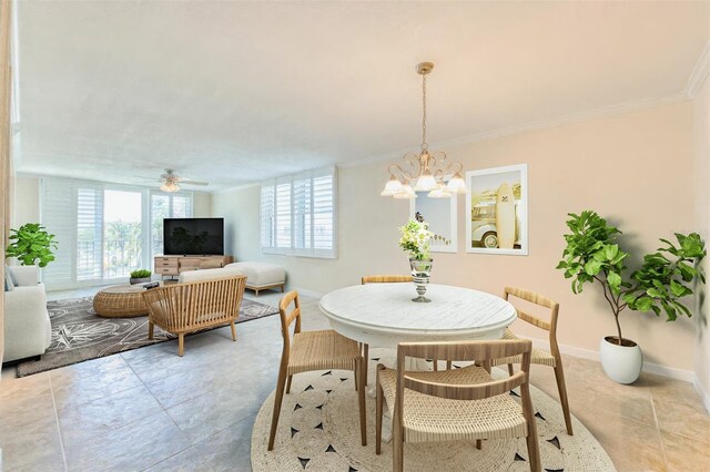 100 Oakmont Ln Unit 301, Belleair, FL 33756 - dining space featuring a ceiling fan, ornamental molding, a chandelier, baseboards, and light tile patterned floors
