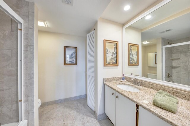 100 Oakmont Ln Unit 301, Belleair, FL 33756 - full bathroom with toilet, a stall shower, vanity, baseboards, and recessed lighting