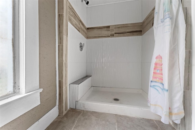 bathroom featuring walk in shower