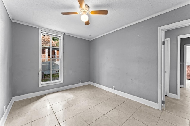 unfurnished room featuring ceiling fan, light tile patterned floors, and a wealth of natural light