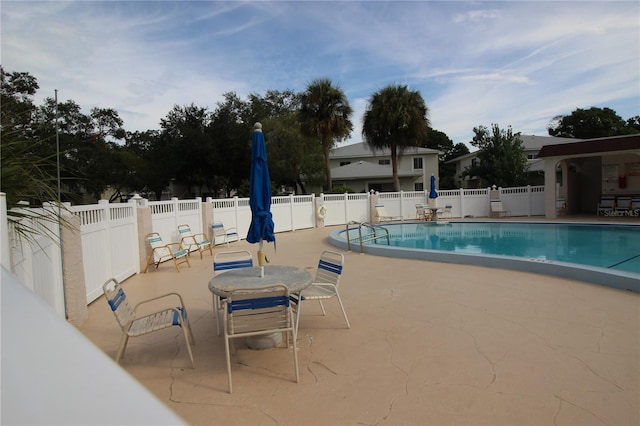 view of pool with a patio