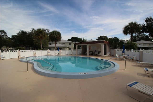 view of swimming pool featuring a patio