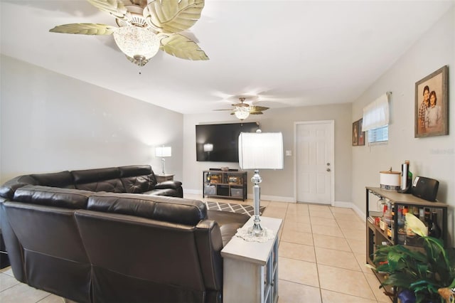 tiled living room featuring ceiling fan