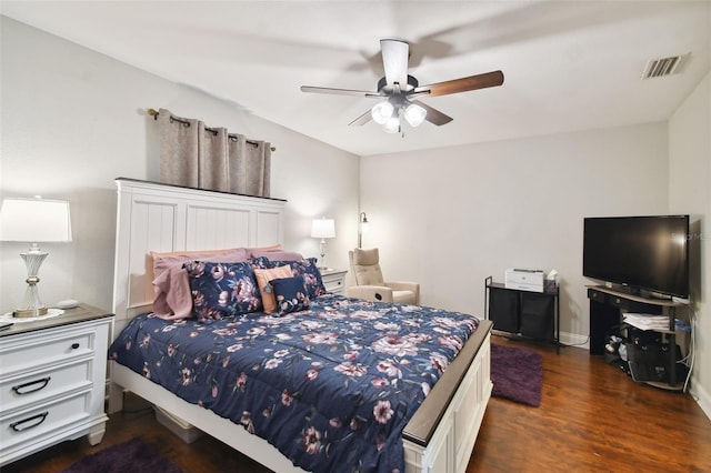 bedroom featuring dark hardwood / wood-style floors and ceiling fan