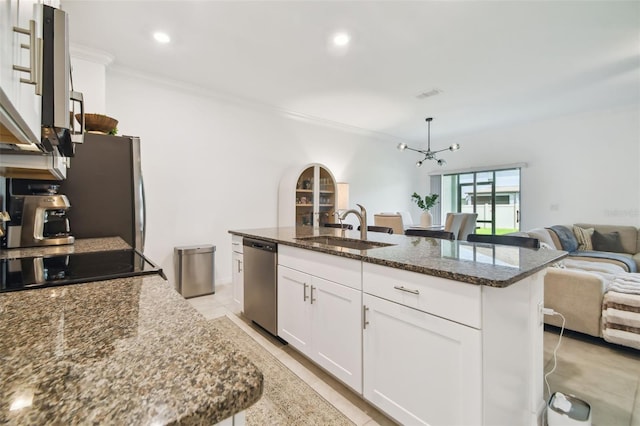 kitchen with sink, white cabinets, dishwasher, and a center island with sink