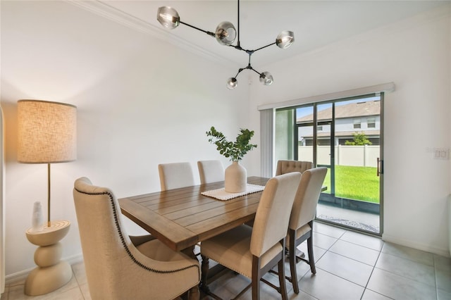 dining area featuring light tile patterned flooring and ornamental molding