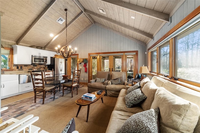 living room featuring beamed ceiling, wooden ceiling, high vaulted ceiling, and an inviting chandelier