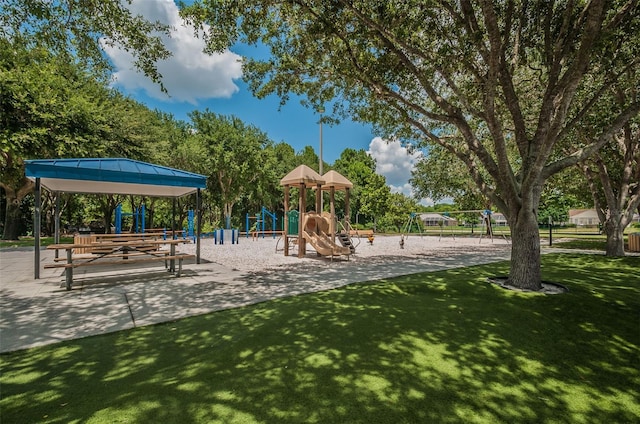 view of playground featuring a lawn