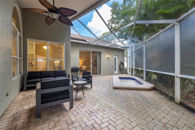 sunroom with ceiling fan