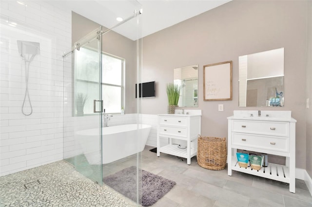 bathroom featuring tile patterned flooring, vanity, and independent shower and bath