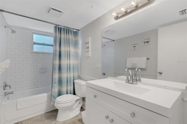 full bathroom with tile patterned flooring, shower / tub combo, vanity, and toilet