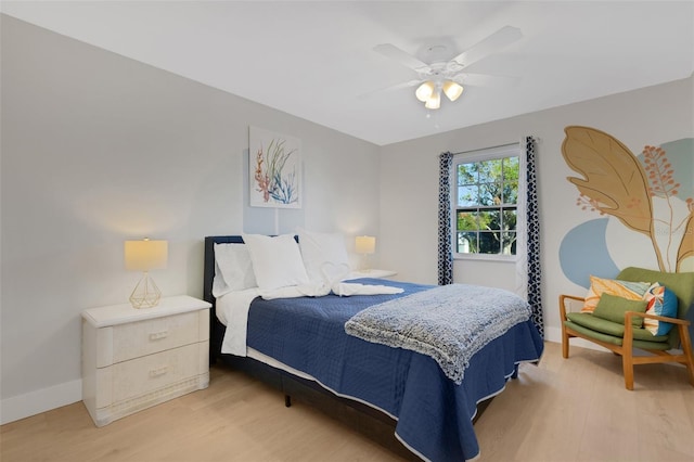 bedroom featuring light wood-type flooring and ceiling fan