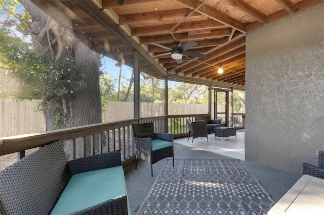 exterior space featuring outdoor lounge area, a patio, and ceiling fan