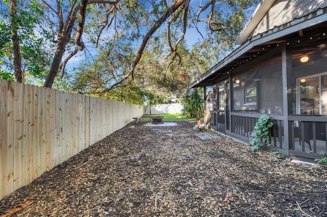 view of yard with a sunroom