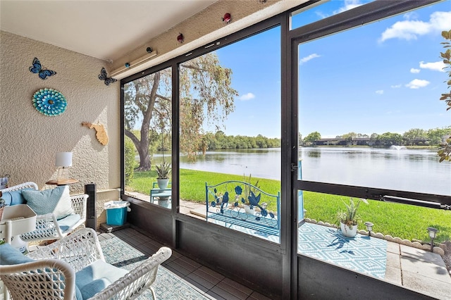 sunroom with a water view