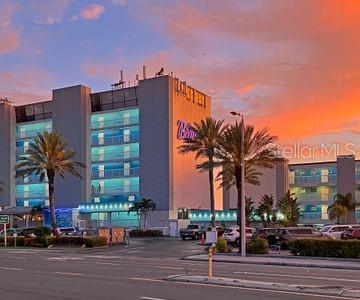 view of outdoor building at dusk