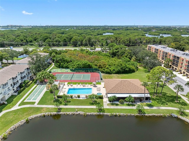 drone / aerial view with a water view