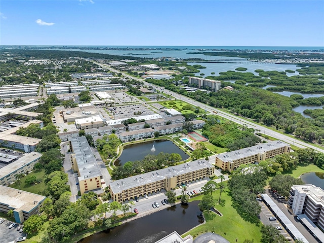 bird's eye view featuring a water view and a city view