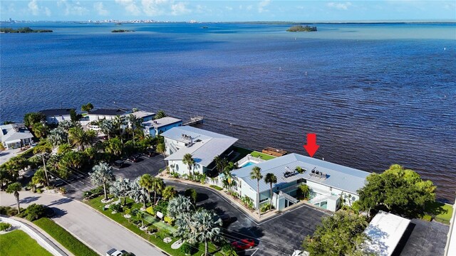 drone / aerial view with a water view