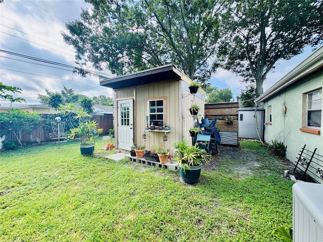 exterior space with a shed