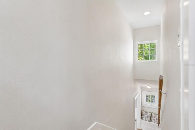 106 19th Ave, St Pete Beach, FL 33706 - staircase featuring baseboards