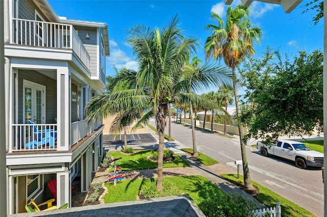 106 19th Ave, St Pete Beach, FL 33706 - view of yard with a balcony