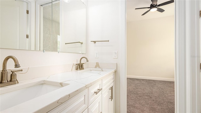 bathroom with ceiling fan and double sink vanity