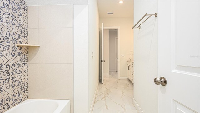 bathroom featuring tile patterned floors and vanity