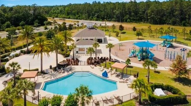 view of swimming pool featuring a patio