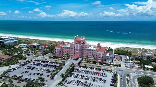 bird's eye view featuring a water view and a view of the beach