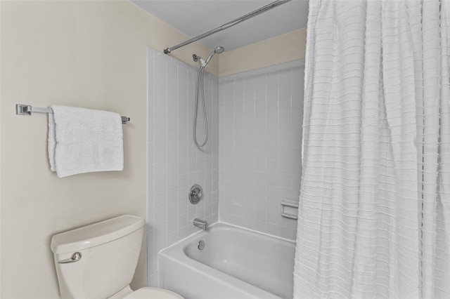 bathroom with toilet and shower / bathtub combination with curtain