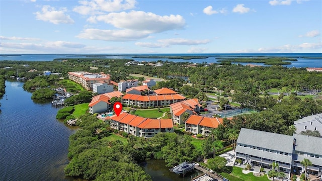 birds eye view of property featuring a water view