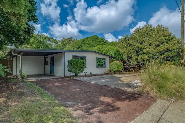 view of outdoor structure with a carport