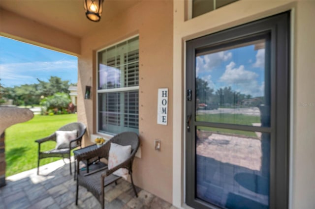 116 Caladium Ct, Bradenton, FL 34212 - view of exterior entry with stucco siding
