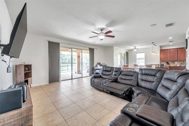 116 Caladium Ct, Bradenton, FL 34212 - living area featuring a ceiling fan, light tile patterned floors, baseboards, and recessed lighting