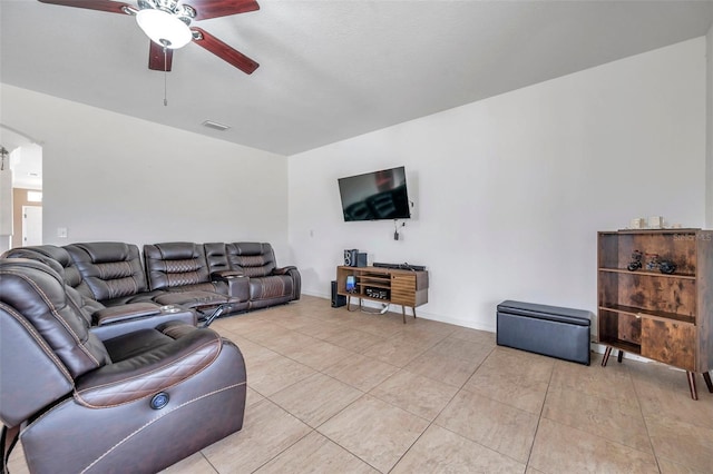 116 Caladium Ct, Bradenton, FL 34212 - living room with a ceiling fan, arched walkways, and light tile patterned floors