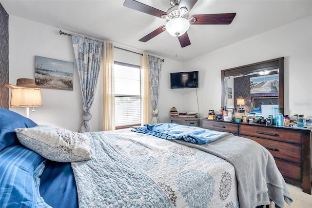 carpeted bedroom featuring ceiling fan