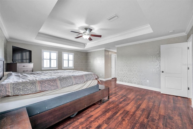 116 Caladium Ct, Bradenton, FL 34212 - bedroom featuring a raised ceiling, wood finished floors, crown molding, ceiling fan, and baseboards