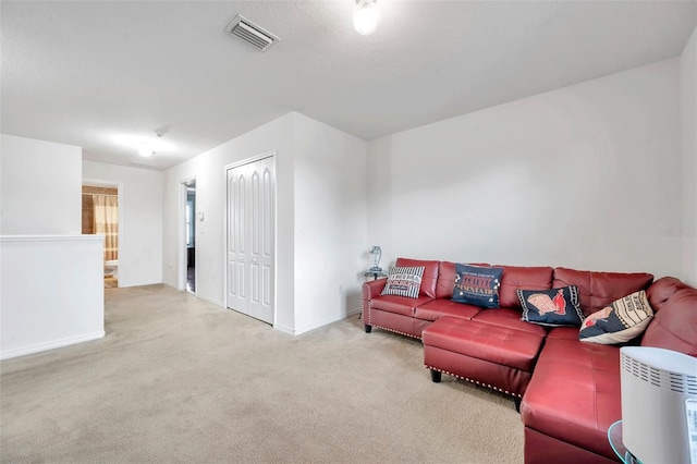 116 Caladium Ct, Bradenton, FL 34212 - carpeted living room with baseboards