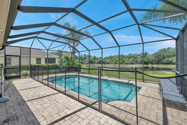 116 Caladium Ct, Bradenton, FL 34212 - outdoor pool featuring a patio area, a lanai, and view of scattered trees