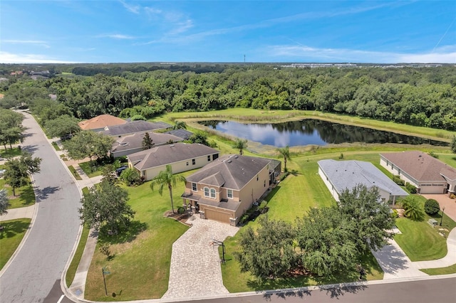 116 Caladium Ct, Bradenton, FL 34212 - aerial perspective of suburban area with a forest and a large body of water