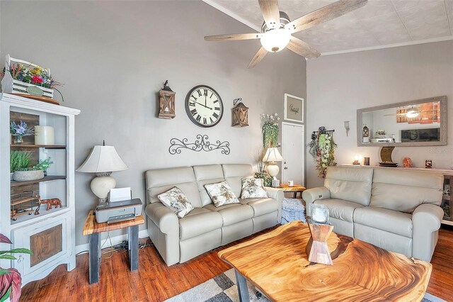 living room with ceiling fan, crown molding, and wood-type flooring