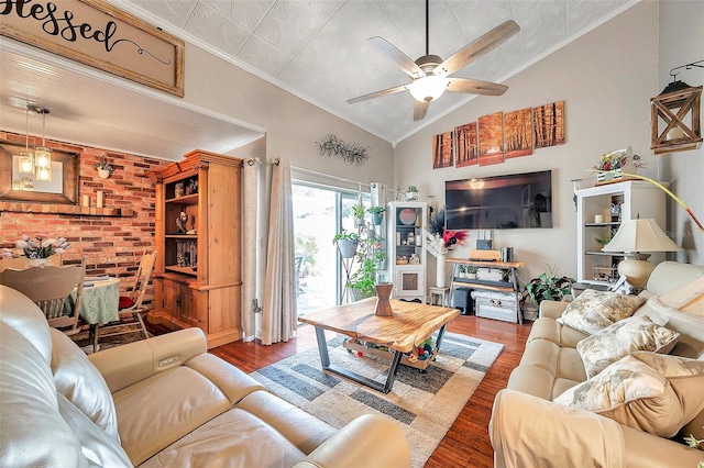 living room featuring hardwood / wood-style floors, crown molding, brick wall, and ceiling fan