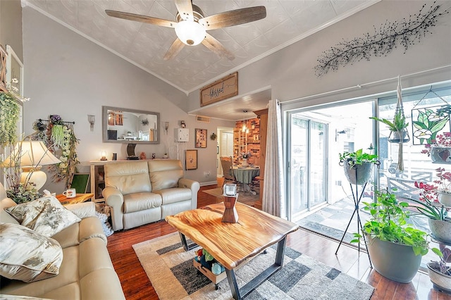 living room featuring ceiling fan, brick wall, high vaulted ceiling, hardwood / wood-style flooring, and crown molding