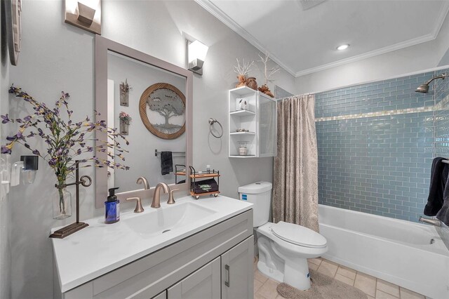 full bathroom with toilet, vanity, tile patterned floors, crown molding, and shower / tub combo with curtain